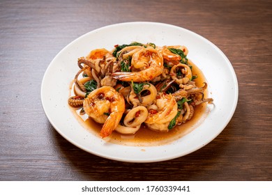 Stir-fried Seafood (shrimps And Squid) With Thai Basil - Asian Food Style