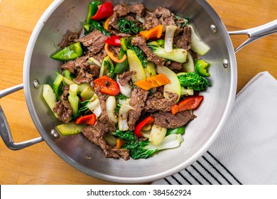 Stir-fry With Beef And Vegetables. Made With Flank Steak, Peppers, Onions And Bok Choy, Stir Fried In An Asian Wok.