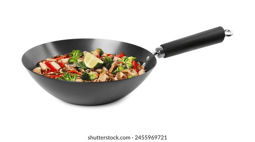 Stir-fry. Tasty noodles with meat and vegetables in wok isolated on white - Powered by Shutterstock