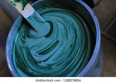 Stirring Green Paint 