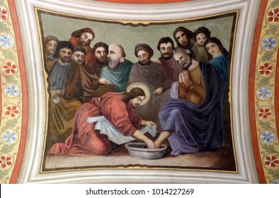 STITAR, CROATIA - JUNE 24: Jesus washes the feet of Peter, fresco in the church of Saint Matthew in Stitar, Croatia on June 24, 2017.