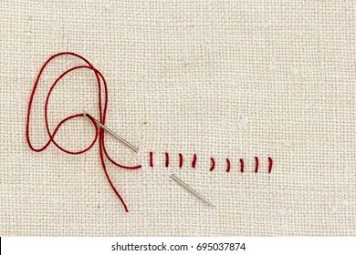 Stitches And Needle - Proverb: One Stitch In Time Saves Nine.