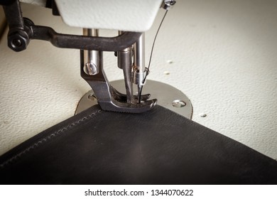 Stitching Leather Products In A Leather Workshop