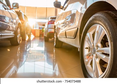 Stock of cars in showroom of automobile dealer