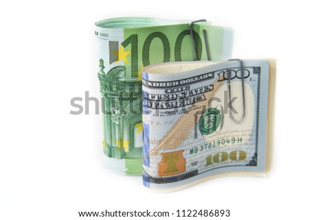 Stock of dollars and euros on the white