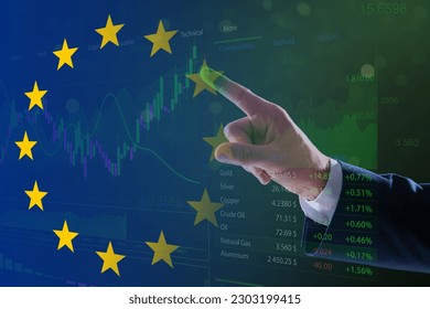 Stock exchange. Double exposure with European flag and man using digital screen with trading data and graphs - Shutterstock ID 2303199415