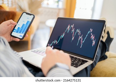 Stock exchange online trader statistics laptop screen workplace in the office finance and budget online - Shutterstock ID 2164275131
