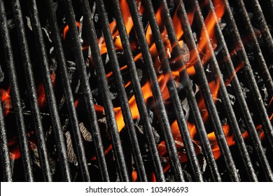 Stock image of charcoal fire grill, close up with live flames