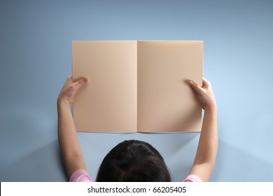 Stock Image Of A Girl Holding A Blank Book.
