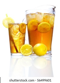 Stock Image Of Pitcher And Glass Of Iced Tea Over White Background With Reflection On Bottom, Could Be Long Island Iced Tea. Find More Cocktail And Prepared Drinks Images On My Portfolio.