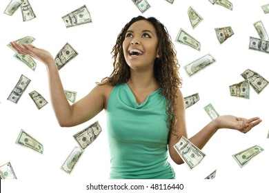 Stock Image Of Woman Standing With Open Arms Amidst Falling Money