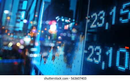 stock index numbers with city scene reflect on glass