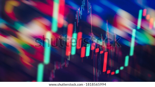 Stock market business graph chart on digital\
screen. Stock prices chart and Candle stick tracking for Forex\
market, Gold market and Crude oil\
market.