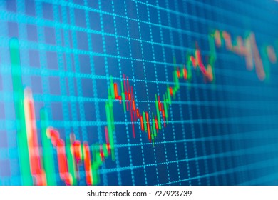 Stock market chart, graph on blue background. Stock diagram on the screen. Online forex data. World economics graph. Blue background with stock chart. Stock market quotes on display. 
