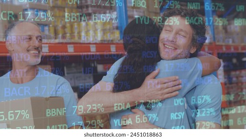 Stock market data processing against diverse male and female volunteers hugging at warehouse. logistics and transportation business concept - Powered by Shutterstock