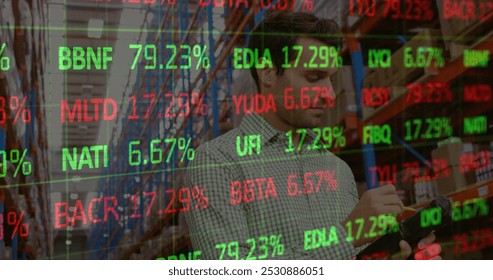 Stock market data processing against caucasian male supervisor checking stock at warehouse. logistics and transportation business concept - Powered by Shutterstock