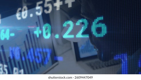 Stock market data processing against caucasian man using laptop at office. global finance and business concept