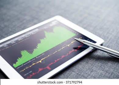 Stock market graph on tablet pc
