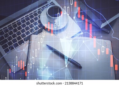 Stock Market Graph And Top View Computer On The Table Background. Multi Exposure. Concept Of Financial Education.