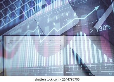 Stock Market Graph And Top View Computer On The Table Background. Multi Exposure. Concept Of Financial Education.