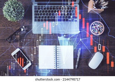 Stock Market Graph And Top View Computer On The Table Background. Double Exposure. Concept Of Financial Education.