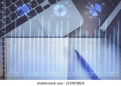 Stock Market Graph And Top View Computer On The Table Background. Multi Exposure. Concept Of Financial Education.