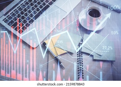 Stock Market Graph And Top View Computer On The Table Background. Double Exposure. Concept Of Financial Education.