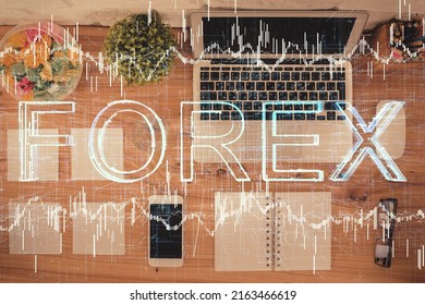 Stock Market Graph And Top View Computer On The Table Background. Multi Exposure. Concept Of Financial Education.