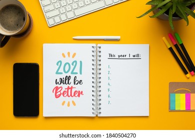 Stock Photo Of 2021 New Year Notebook With List Of Goals And Motivational Phrase