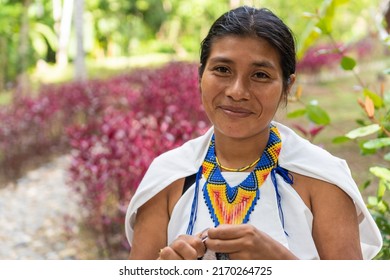 Stock Photo Of A Portrait Of A Colombian Woman In Traditional Clothing. Beautiful Shot Of A Young Indigenous Woman From The Sierra Nevada De Santa Marta, Smiling Looking At The Camera.