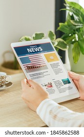 Stock Photo Of A Woman Reading News In A Website On Her Tablet In The Living Room. Concept Of Online Information And Reading Newspapers On The Internet. All Contents Are Composed