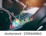 Stock trader analyzing stock graph, Investor investment, Stock Market, Businessman or trader is showing a growing virtual hologram stock, Trading concept, Planning and strategy, Business growth