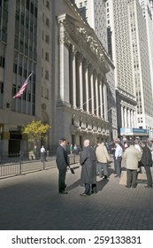 Stock Traders Take A Break In Front Of The New York Stock Exchange On Wall Street, New York City, New York