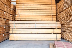 Stock Of Wooden Planks Manufacturing Factory In Industry. Stacks With Pine Lumber, Wood Harvesting Shop, Stacked Wooden Boards For Construction.