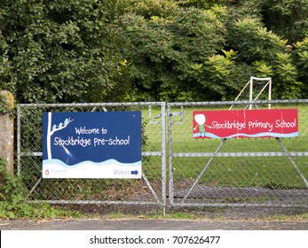 Stockbridge, Hampshire England - June 19, 2017: Welcome To Stockbridge Pre School Banner Mounted On Gate To Playing Field