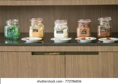 Stocked Kitchen Pantry With Food - Jars And Containers Of Tea,sugar,creamer,ovaltin,coffee