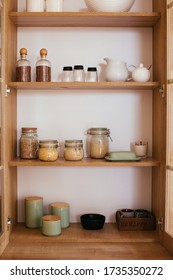 stocked and organiswd kitchen cupboard. cooking from pantry