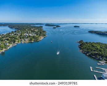 Stockholm archipelago aerial view, baltic sea, Dalarö island. Summer, swedish typical houses, docks and scenery. boats and sailboats passing by. - Powered by Shutterstock