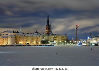 Stockholm, evening view of Riddarholmen island and Gamla Stan in winter, Sweden