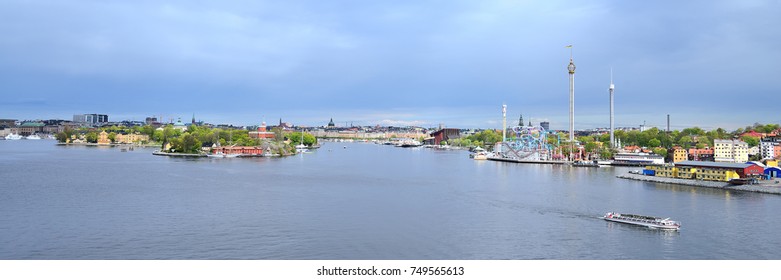 Stockholm harbor. Water craft against sea port and city line panorama, 2014 May 15, Stockholm, Sweden.