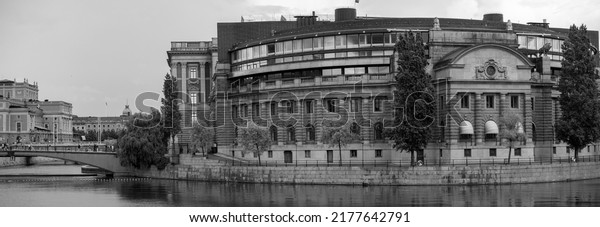 Stockholm,\
Sweden - 07.11.2022: Panoramic view of the Swedish parliament\
building (Rosenbad) on a summer\'s day in black and white. National\
governance and democratic elections\
concept.
