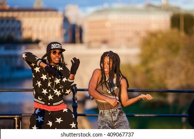 Stockholm, Sweden, 11 October, 2015: Black Afroamerican Man With Star And Woman Gangsta Rap Singer And Dancer