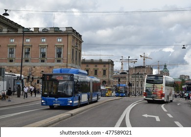 Stockholm, Sweden - 19 August 2016. Blue Bendy Bus At Centrally Located Segregation In Gamla Stan (city Center) In Front Of The Royal Castle