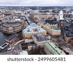 Stockholm, Sweden: Aerial view of the Stockholm Gamla Stan historic district with various landmarks such as the Royal palace and the governement house in, Sweden capital city in winter.