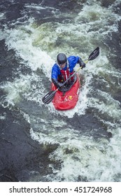 Stockholm, Sweden - April 04, 2016:Man Kayaking In Fast Flowing Rapids. Kayaking In Stockholm. Canoeing On Water River.