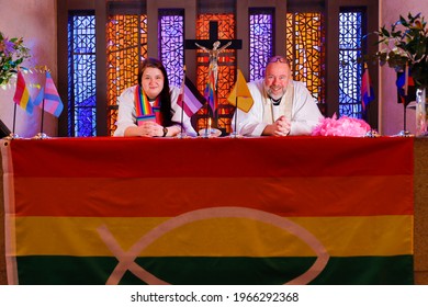 Stockholm, Sweden April 25, 2021 Two Priests In The Swedish Church Pose With A Rainbow LGTBQ Flag To Promote Diversity Within The Church.