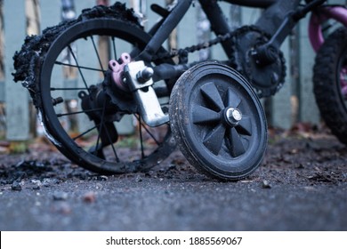 Stockholm, Sweden A Child's Bicycle With Training Wheels Vandalised And Burned.