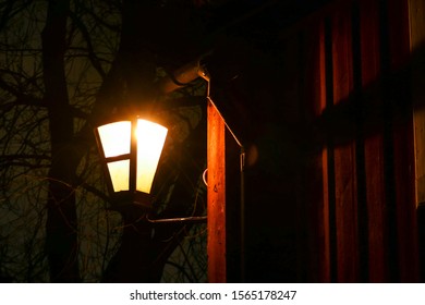 Stockholm, Sweden A Dark Street Corner Illuminated By A Gas Lamp.