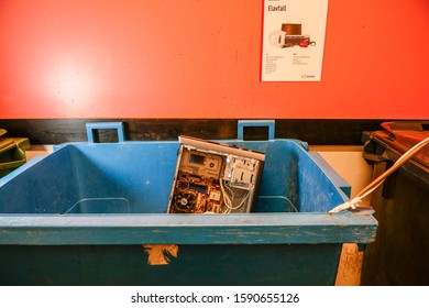 Stockholm, Sweden Dec 16, 2019 A Garbage Room Bin In A Coop Apartment Building For Collecting Electronic And Electrical Waste.