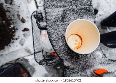 Stockholm, Sweden An Empty Paper Coffee Cup Sits On Top Of A Stroller At An Outdoor Church Gathering Because Of Covid-19.